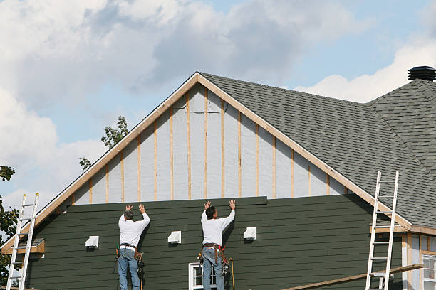Professional Siding Replacement technician working in Holloway, OH